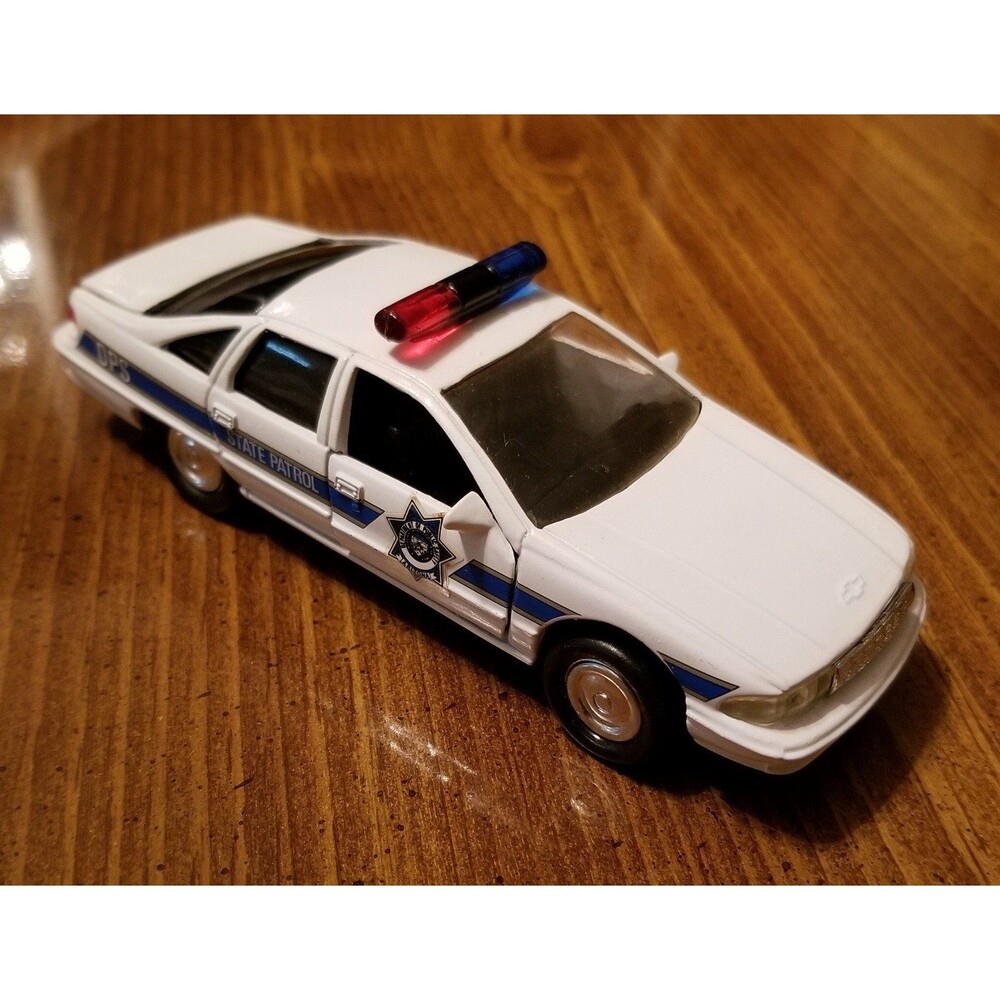 Arizona Dept. Of Public Safety Road Champs die cast police car 1:43 scale